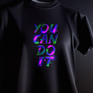 Vibrant neon purple and blue 'You Can Do It' typography print on a black t-shirt using Glow in the Dark DTF transfer.